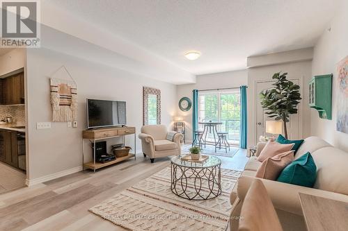 210 - 44 Ferndale Drive S, Barrie, ON - Indoor Photo Showing Living Room