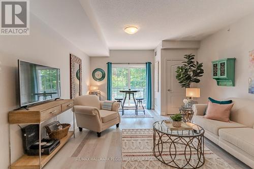 210 - 44 Ferndale Drive S, Barrie, ON - Indoor Photo Showing Living Room