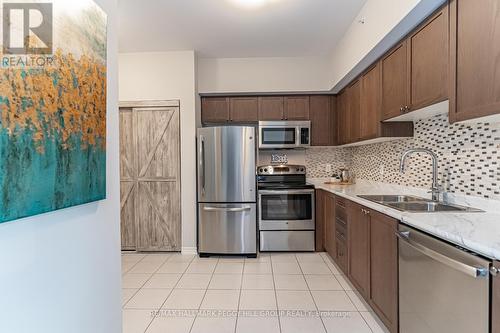 210 - 44 Ferndale Drive S, Barrie, ON - Indoor Photo Showing Kitchen With Double Sink With Upgraded Kitchen