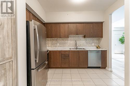 210 - 44 Ferndale Drive S, Barrie, ON - Indoor Photo Showing Kitchen With Double Sink