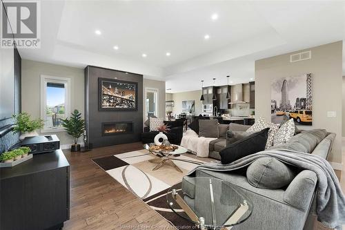 4 Malibu Drive, Leamington, ON - Indoor Photo Showing Living Room With Fireplace