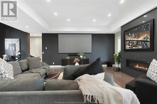 4 Malibu Drive, Leamington, ON - Indoor Photo Showing Living Room With Fireplace