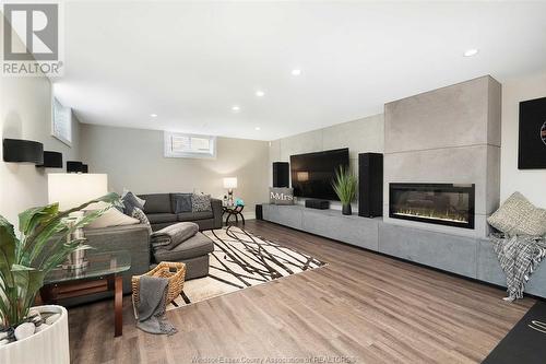 4 Malibu Drive, Leamington, ON - Indoor Photo Showing Living Room With Fireplace