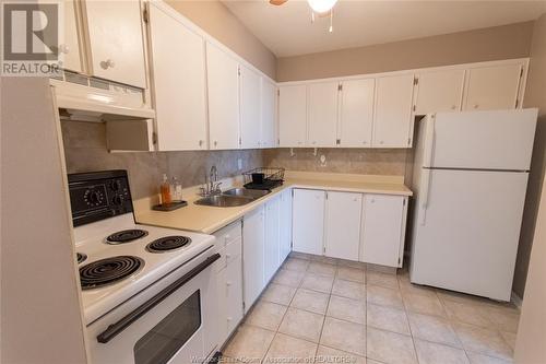 111 Riverside Unit# 404, Windsor, ON - Indoor Photo Showing Kitchen With Double Sink