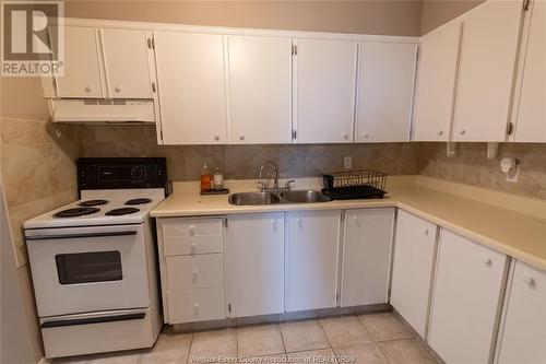 111 Riverside Unit# 404, Windsor, ON - Indoor Photo Showing Kitchen With Double Sink