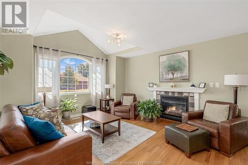 10 Elwood, Cottam, ON - Indoor Photo Showing Living Room With Fireplace