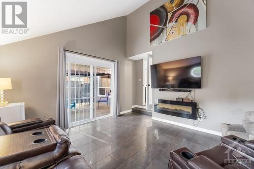 13 Sage Crescent, Ottawa, ON - Indoor Photo Showing Living Room With Fireplace