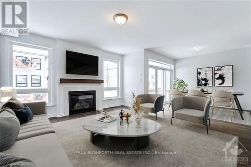 1006 Brian Good Avenue, Ottawa, ON - Indoor Photo Showing Living Room With Fireplace