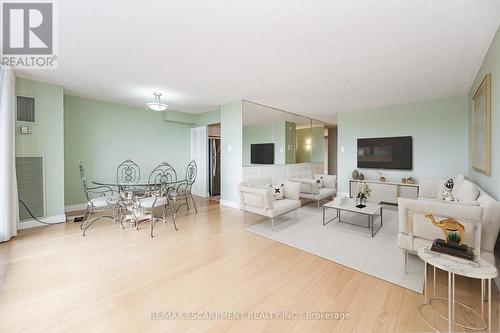 1008 - 2055 Upper Middle Road, Burlington, ON - Indoor Photo Showing Living Room