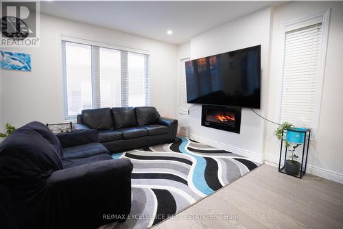 3084 Tillmann Road, London, ON - Indoor Photo Showing Living Room With Fireplace