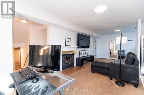 140 Dinison Crescent, Kitchener, ON - Indoor Photo Showing Living Room With Fireplace