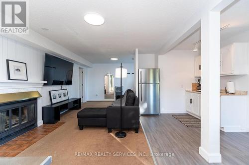 140 Dinison Crescent, Kitchener, ON - Indoor Photo Showing Living Room With Fireplace