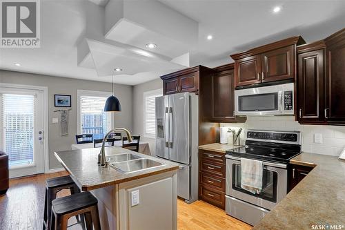 A4 33 Wood Lily Drive, Moose Jaw, SK - Indoor Photo Showing Kitchen With Double Sink