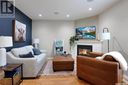 A4 33 Wood Lily Drive, Moose Jaw, SK - Indoor Photo Showing Other Room With Fireplace