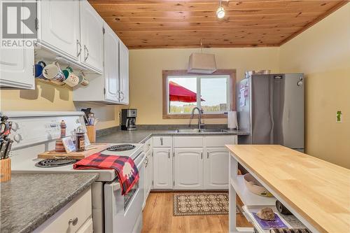 729 Dry Pine Bay Rd, Alban, ON - Indoor Photo Showing Kitchen With Double Sink