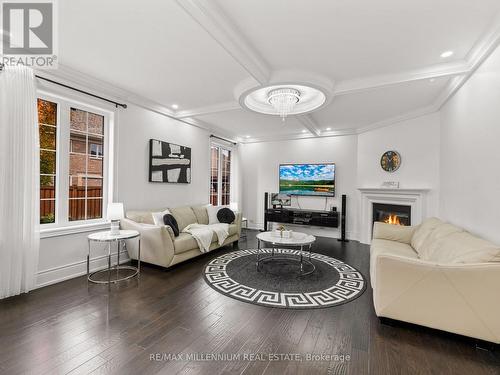 24 Black Duck Trail, King, ON - Indoor Photo Showing Living Room With Fireplace