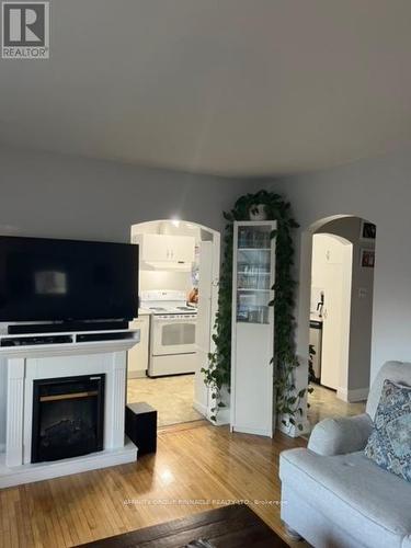 104 Short Avenue, Kawartha Lakes (Lindsay), ON - Indoor Photo Showing Living Room With Fireplace