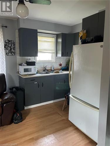 19 Piette Street, Verner, ON - Indoor Photo Showing Kitchen With Double Sink