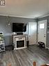 19 Piette Street, Verner, ON  - Indoor Photo Showing Living Room With Fireplace 