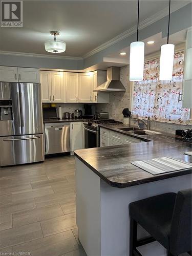 19 Piette Street, Verner, ON - Indoor Photo Showing Kitchen With Double Sink