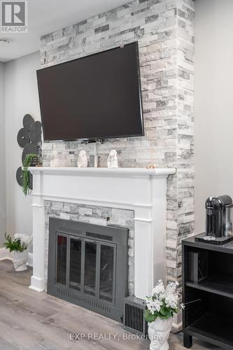 1024 Cedarwood Place, Burlington, ON - Indoor Photo Showing Living Room With Fireplace