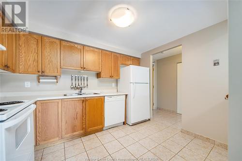 451 Grand Marais Road West Unit# 116, Windsor, ON - Indoor Photo Showing Kitchen With Double Sink