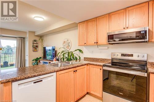 625 St David Street S Unit# 412, Fergus, ON - Indoor Photo Showing Kitchen With Double Sink