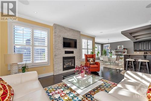 700 Beaudelaire Drive, Ottawa, ON - Indoor Photo Showing Living Room With Fireplace