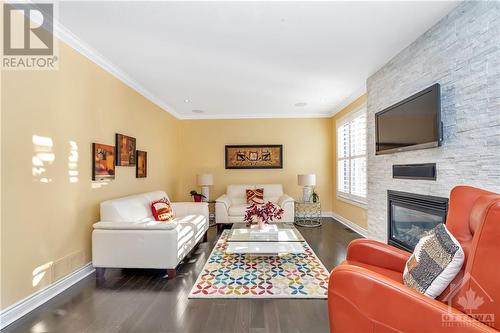 700 Beaudelaire Drive, Ottawa, ON - Indoor Photo Showing Living Room With Fireplace