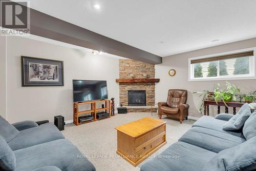 1 Pier Drive, Brighton, ON - Indoor Photo Showing Living Room With Fireplace