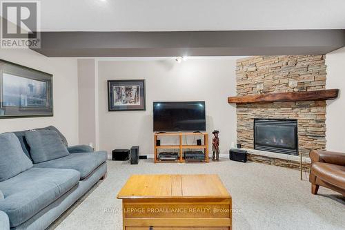 1 Pier Drive, Brighton, ON - Indoor Photo Showing Living Room With Fireplace