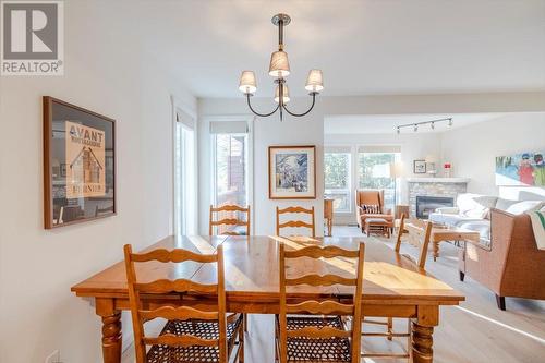 #10 4576 Timberline Crescent, Fernie, BC - Indoor Photo Showing Dining Room With Fireplace