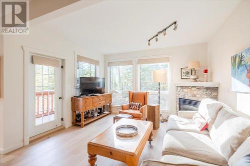 #10 4576 Timberline Crescent, Fernie, BC - Indoor Photo Showing Living Room With Fireplace