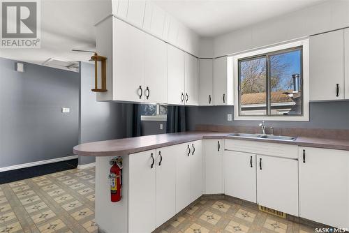 1826 Dewdney Avenue E, Regina, SK - Indoor Photo Showing Kitchen With Double Sink