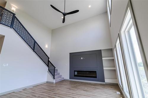 128 Cowley Street, Winnipeg, MB - Indoor Photo Showing Other Room With Fireplace