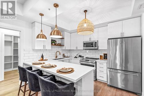 108 - 650 Gordon Street, Whitby (Port Whitby), ON - Indoor Photo Showing Kitchen With Stainless Steel Kitchen With Upgraded Kitchen