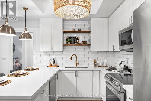 108 - 650 Gordon Street, Whitby (Port Whitby), ON - Indoor Photo Showing Kitchen With Double Sink With Upgraded Kitchen