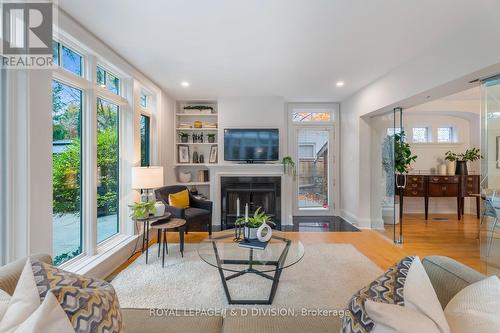 99 Cortleigh Boulevard, Toronto, ON - Indoor Photo Showing Living Room With Fireplace