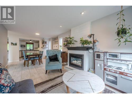 187 Brooks Place, Penticton, BC - Indoor Photo Showing Living Room With Fireplace