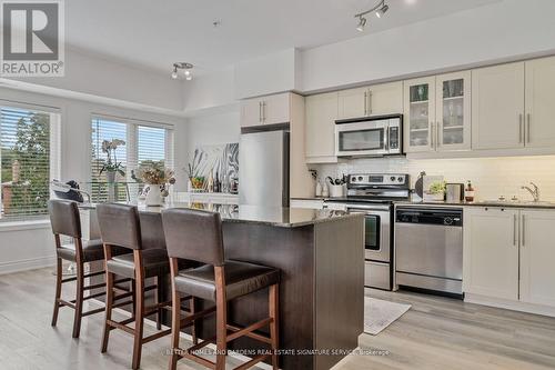 210 - 5 Richgrove Drive, Toronto, ON - Indoor Photo Showing Kitchen With Upgraded Kitchen