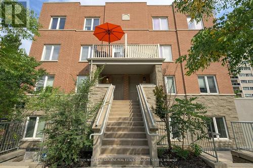 210 - 5 Richgrove Drive, Toronto, ON - Outdoor With Balcony