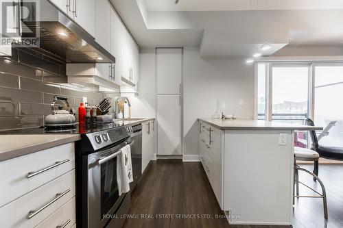 313 - 128 Garden Drive, Oakville, ON - Indoor Photo Showing Kitchen With Upgraded Kitchen