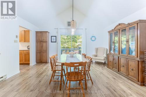 Dining room walk out on to outdoor deck - 10248 Pinetree Drive, Lambton Shores (Grand Bend), ON - Indoor Photo Showing Dining Room