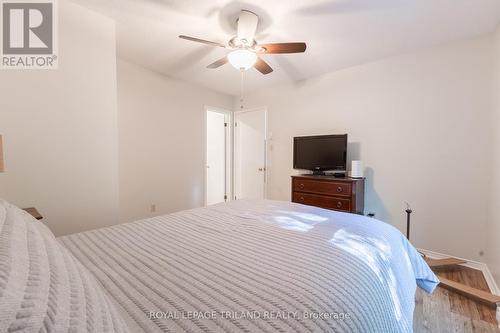 Nice bright primary bedroom with ceiling fan - 10248 Pinetree Drive, Lambton Shores (Grand Bend), ON - Indoor Photo Showing Bedroom