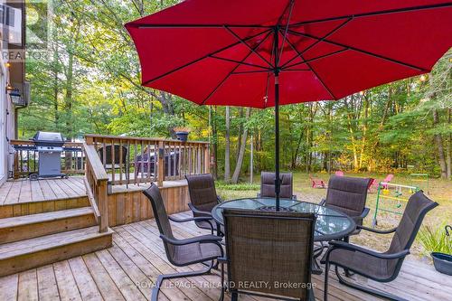 Back deck with several entertaining spaces - 10248 Pinetree Drive, Lambton Shores (Grand Bend), ON - Outdoor With Deck Patio Veranda With Exterior