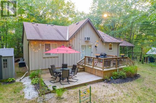 View of rear of the house - 10248 Pinetree Drive, Lambton Shores (Grand Bend), ON - Outdoor With Deck Patio Veranda With Exterior