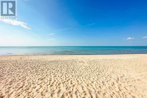 10 minute walk to this gorgeous beach - 10248 Pinetree Drive, Lambton Shores (Grand Bend), ON - Outdoor With Body Of Water With View