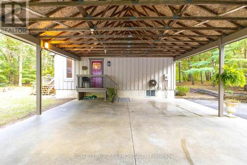 Dole carport with concrete - 10248 Pinetree Drive, Lambton Shores (Grand Bend), ON - 