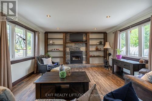 1760 Stewart Line, Cavan Monaghan, ON - Indoor Photo Showing Living Room With Fireplace