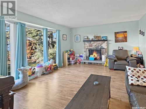 572 100Th Street, North Battleford, SK - Indoor Photo Showing Living Room With Fireplace